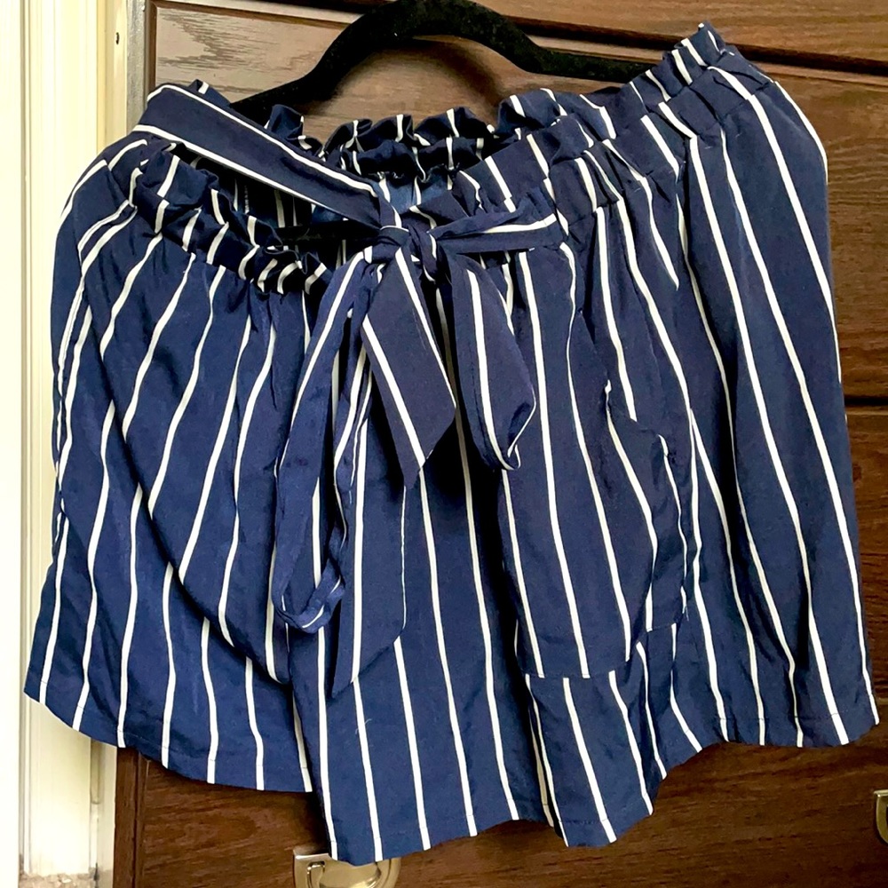 Navy and white striped shorts with tie belt